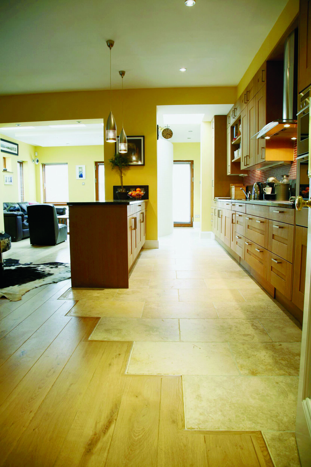 Kitchen with travertine floor and French oak